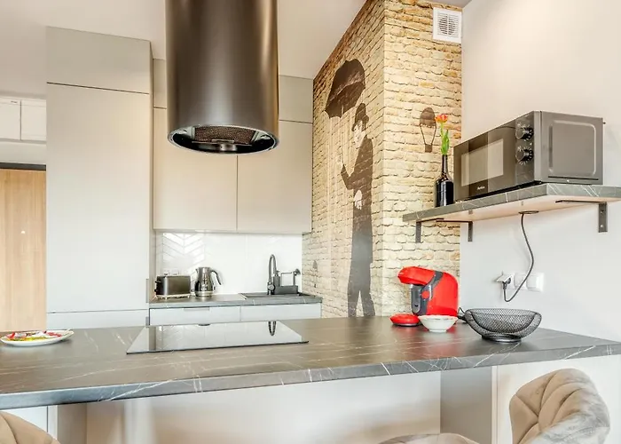 Apartment Manufaktura Business Suites: Urban Retreat With Parking And Nature Views