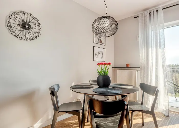 Manufaktura Business Suites: Urban Retreat With Parking And Nature Views